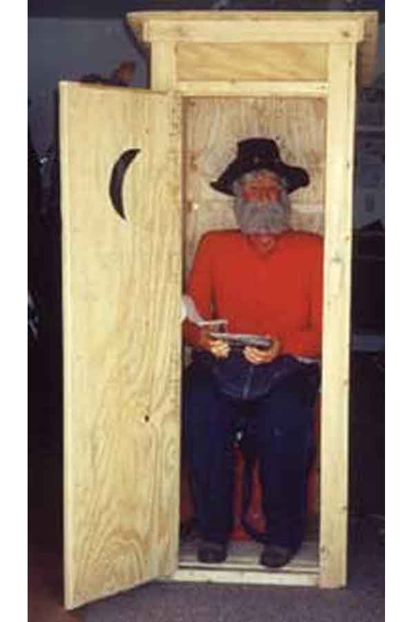 Man in Outhouse