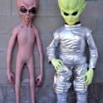 Bare Alien and Green Alien with Space Suit